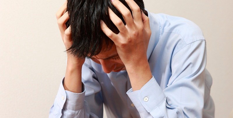 Person experiencing visible stress